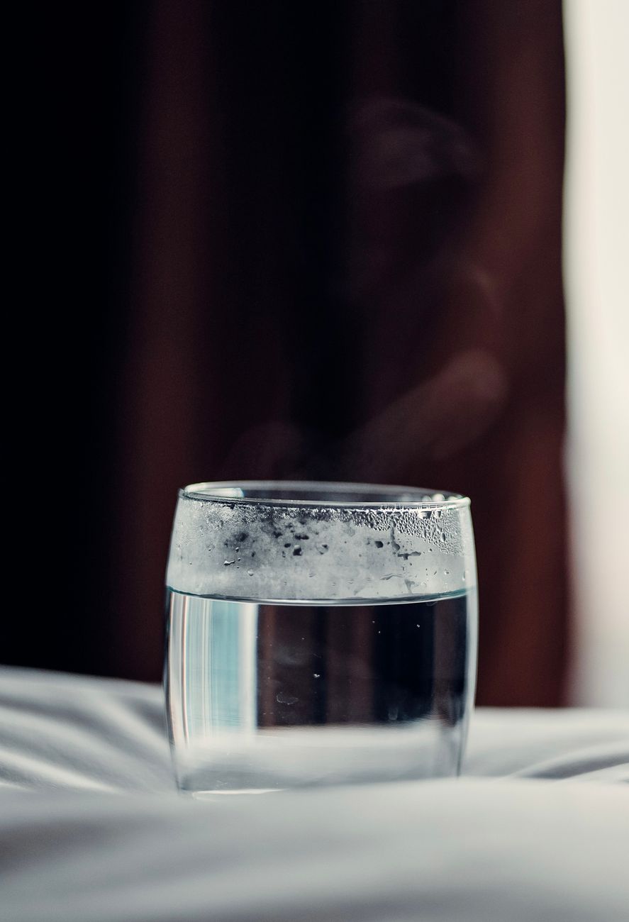 clear drinking glass with water