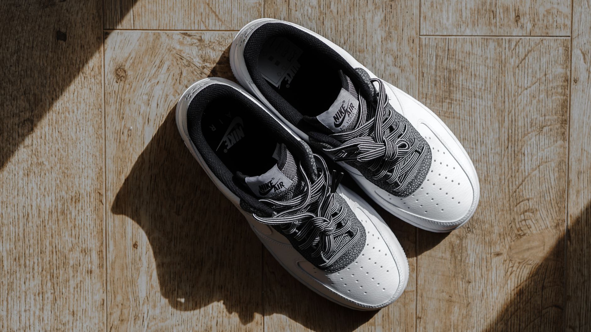 white and gray trainers