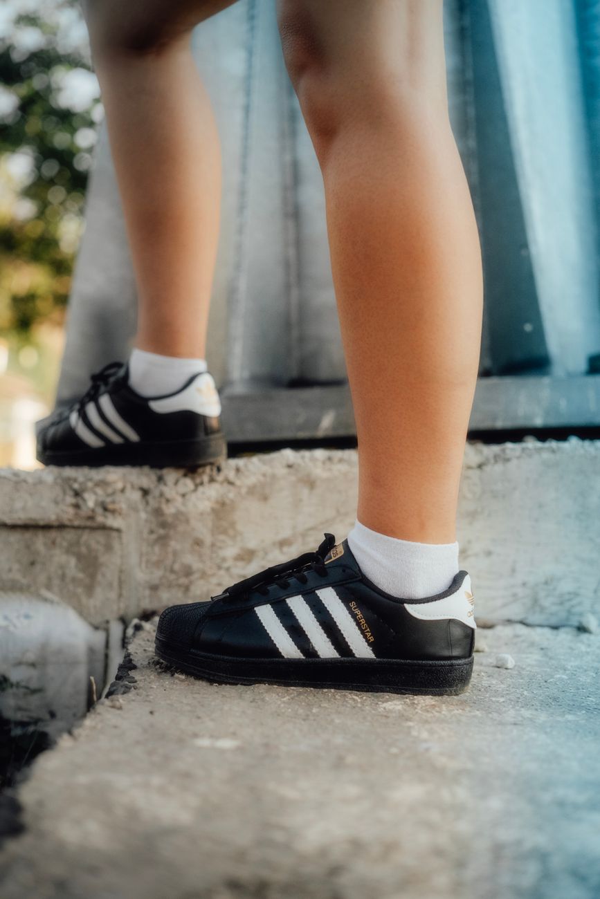 sneakers on feet