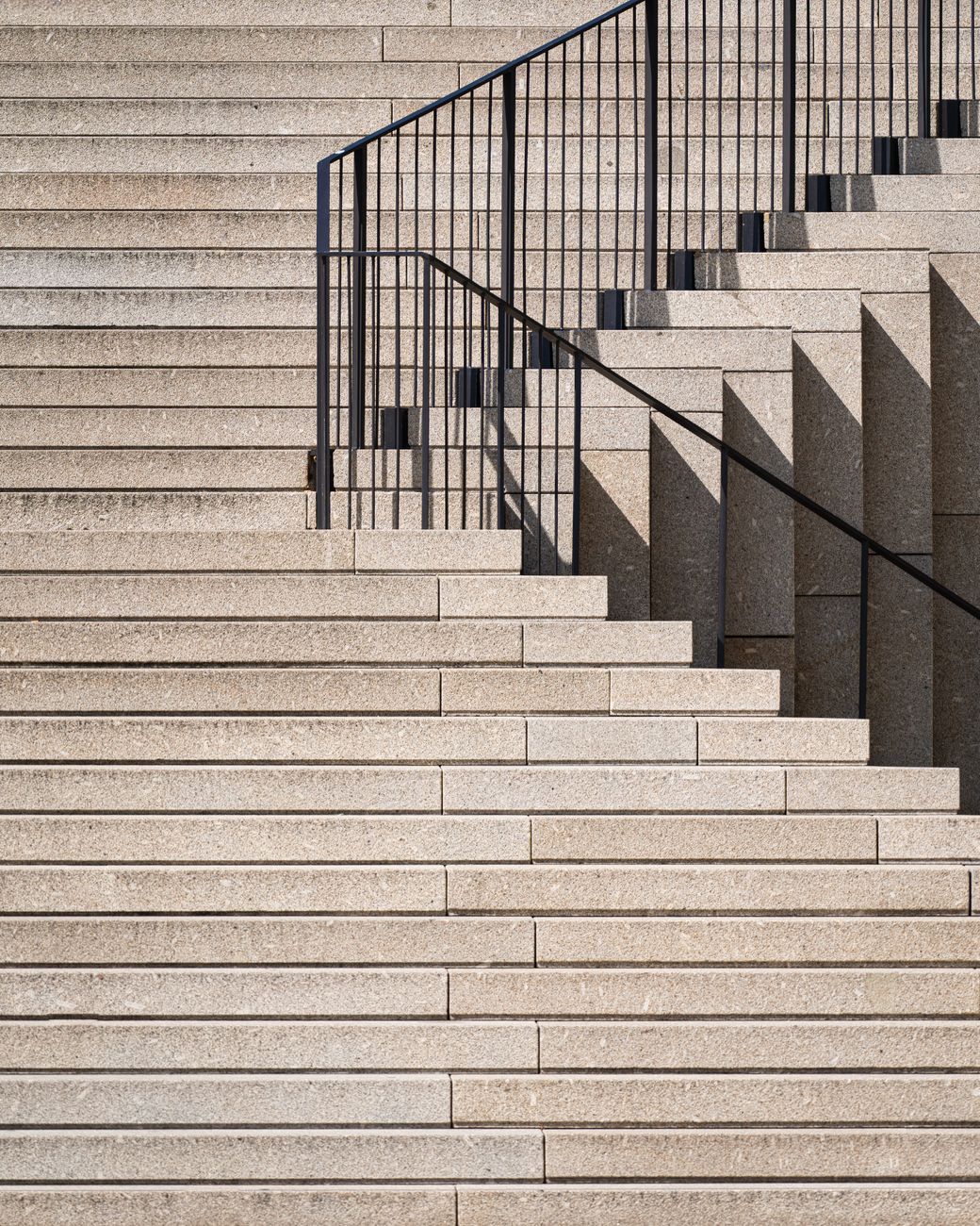 abstract architectural stone staircase with shadows